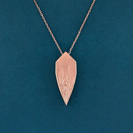 Luxury Andromeda pendant necklace handcrafted in 18K ethical gold with celestial-inspired design and engraved details, echoing the myth and constellation – designed by Riccardo Contini