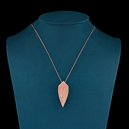 Luxury Andromeda pendant necklace handcrafted in 18K ethical gold with celestial-inspired design and engraved details, echoing the myth and constellation – designed by Riccardo Contini