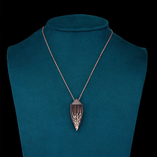 Luxury Eclissi Andromeda pendant handcrafted in 18K rose ethical gold with burned engravings, inspired by celestial phenomena and cosmic elegance – designed by Riccardo Contini