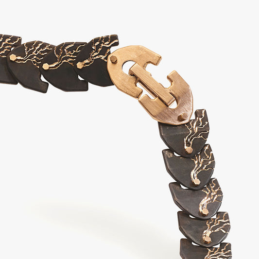 Luxury Eclissi Cuore di Moringa necklace handcrafted in 18K rose ethical gold with burned, engraved details—limited edition of 7 pieces, designed by Riccardo Contini