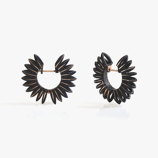 Luxury Eclissi Sole Tribale earrings handcrafted in 18K rose ethical gold with burned, engraved details—radiating tribal elegance and solar inspiration, designed by Riccardo Contini