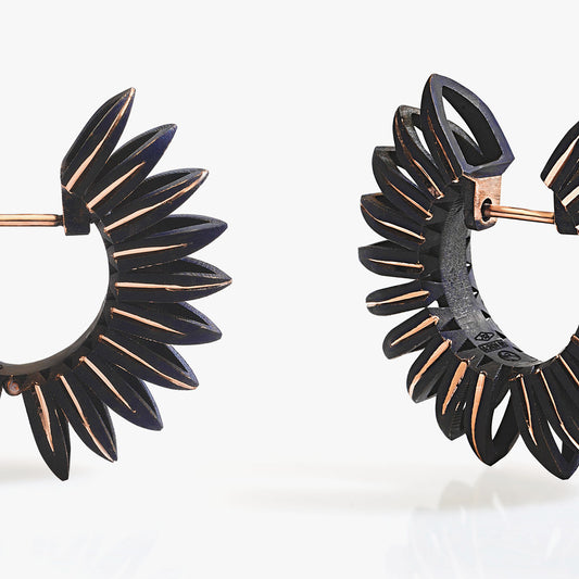 Luxury Eclissi Sole Tribale earrings handcrafted in 18K rose ethical gold with burned, engraved details—radiating tribal elegance and solar inspiration, designed by Riccardo Contini