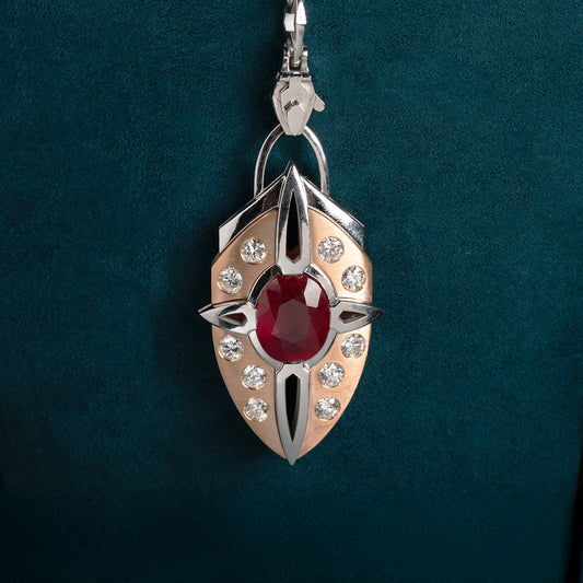 Luxury Nuvola Rossa pendant necklace handcrafted in 18K ethical gold with a vivid ruby, evoking the fiery soul of a red cloud in motion – designed by Riccardo Contini