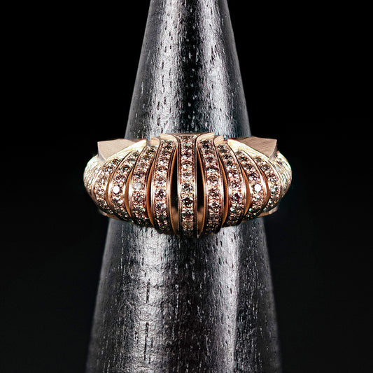 Luxury Ponti ring handcrafted in 18K rose ethical gold with brownish diamonds, inspired by the journey across life's bridges—bold, symbolic, and timeless by Riccardo Contini