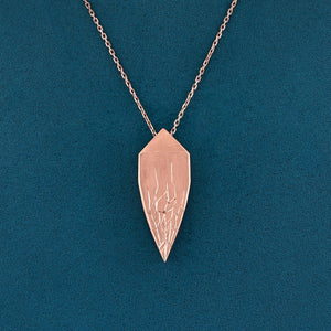 Luxury Andromeda pendant necklace handcrafted in 18K ethical gold with celestial-inspired design and engraved details, echoing the myth and constellation – designed by Riccardo Contini