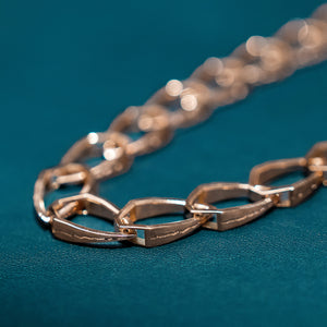 Luxury Attraverso il Tuono necklace handcrafted in 18K rose ethical gold with engraved details, designed by Riccardo Contini