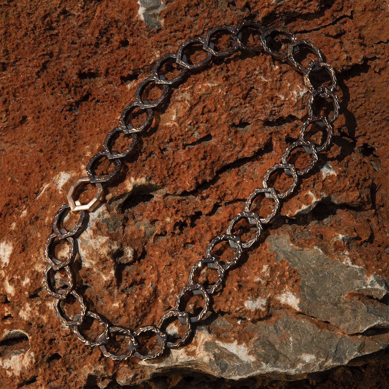 Luxury Braci necklace handcrafted in 18K rose ethical gold with burned engravings, designed by Riccardo Contini

