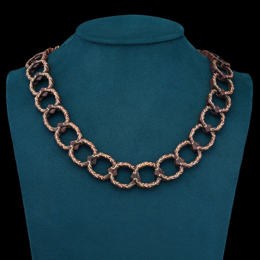 Luxury Braci necklace handcrafted in 18K rose ethical gold with burned engravings, designed by Riccardo Contini

