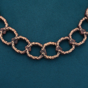 Luxury Braci necklace handcrafted in 18K rose ethical gold with burned engravings, designed by Riccardo Contini


