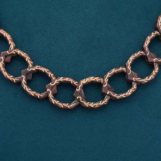 Luxury Braci necklace handcrafted in 18K rose ethical gold with burned engravings, designed by Riccardo Contini

