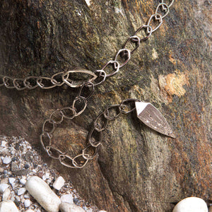Luxury Catena Andromeda necklace handcrafted in 18K natural white ethical gold with engraved details, inspired by the cosmic elegance of the Andromeda constellation – designed by Riccardo Contini