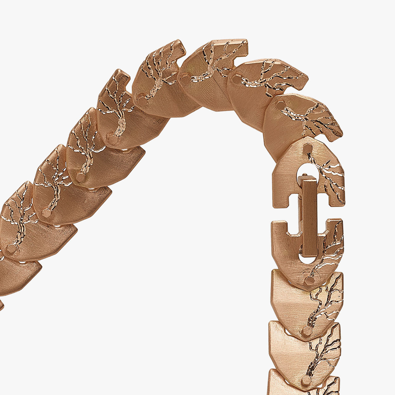 Luxury Cuore di Moringa necklace handcrafted in 18K rose FairTrade ethical gold, featuring intricate burned and engraved details—designed by Riccardo Contini