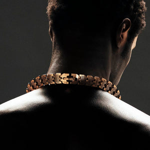Luxury Cuore di Moringa necklace handcrafted in 18K rose FairTrade ethical gold, featuring intricate burned and engraved details—designed by Riccardo Contini
