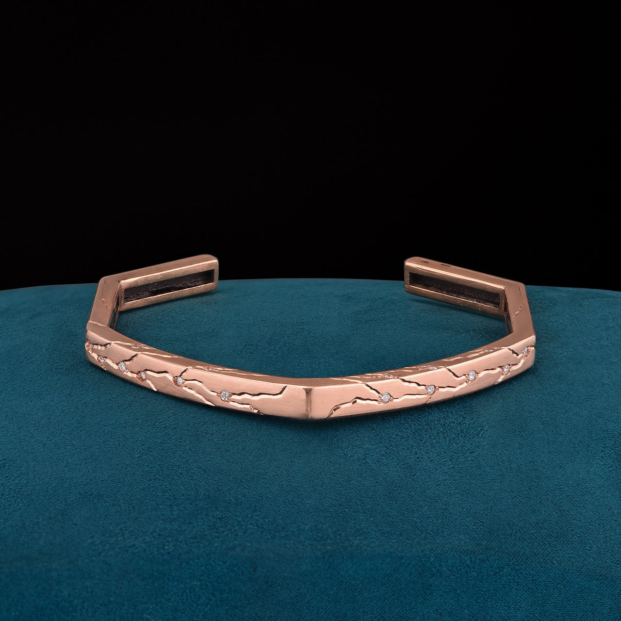 Luxury Dedizione di Luce bracelet handcrafted in 18K rose ethical gold with diamonds, symbolizing unwavering devotion through refined engraving and timeless craftsmanship – designed by Riccardo Contini

