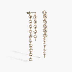 Luxury Legami di Luce earrings handcrafted in 18K rose ethical gold with a satin-burnished finish, evoking the poetic beauty of invisible bonds and light – designed by Riccardo Contini