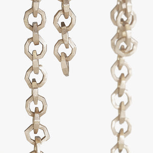 Luxury Legami di Luce earrings handcrafted in 18K rose ethical gold with a satin-burnished finish, evoking the poetic beauty of invisible bonds and light – designed by Riccardo Contini