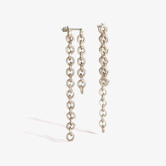 Luxury Legami di Luce earrings handcrafted in 18K rose ethical gold with a satin-burnished finish, evoking the poetic beauty of invisible bonds and light – designed by Riccardo Contini