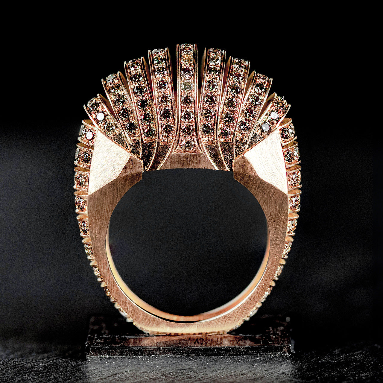 Luxury Ponti ring handcrafted in 18K rose ethical gold with brownish diamonds, inspired by the journey across life's bridges—bold, symbolic, and timeless by Riccardo Contini