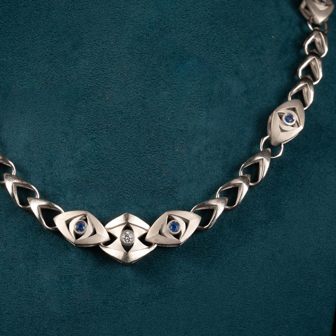 Luxury Soffio di Tate necklace handcrafted in 18K natural white ethical gold, adorned with sapphires and diamonds—an ethereal breath of memory and light by Riccardo Contini