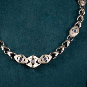 Luxury Soffio di Tate necklace handcrafted in 18K natural white ethical gold, adorned with sapphires and diamonds—an ethereal breath of memory and light by Riccardo Contini
