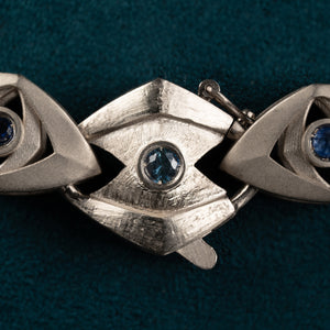 Luxury Soffio di Tate necklace handcrafted in 18K natural white ethical gold, adorned with sapphires and diamonds—an ethereal breath of memory and light by Riccardo Contini