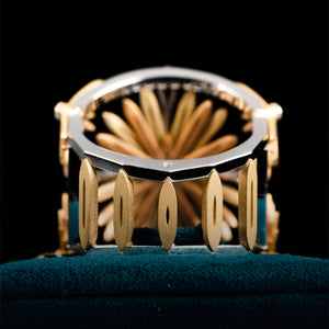 Luxury Sospiro di Echinacea ring handcrafted in 18K ethical gold, adorned with a sapphire—an elegant tribute to the healing strength of the Echinacea flower. Designed by Riccardo Contini