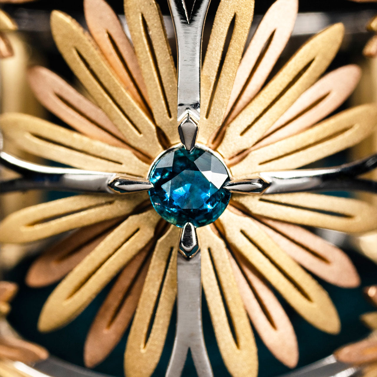 Luxury Sospiro di Echinacea ring handcrafted in 18K ethical gold, adorned with a sapphire—an elegant tribute to the healing strength of the Echinacea flower. Designed by Riccardo Contini
