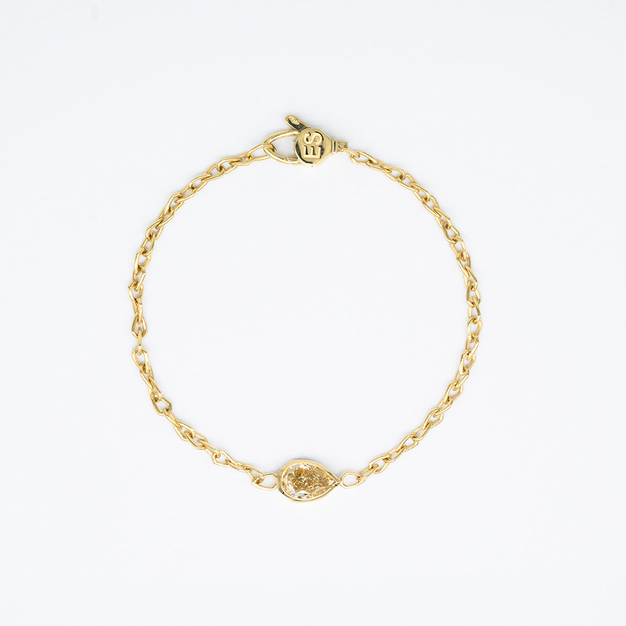 Luxury Sospiro di Luce bracelet handcrafted in 18K yellow ethical gold, featuring a brownish yellow diamond—an intimate breath of light and elegance by Riccardo Contini