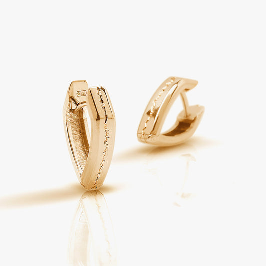 Luxury Terra che Cammina earrings handcrafted in 18K rose ethical gold with engraved details, embodying the essence of the earth in motion—designed by Riccardo Contini