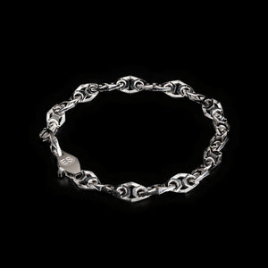 Luxury Xylem bracelet handcrafted in 18K white ethical gold with rhodium plating, inspired by nature's vital channels—symbolizing strength, growth, and the quiet beauty of staying rooted. Designed by Riccardo Contini.