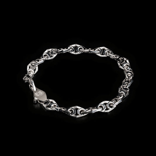 Luxury Xylem bracelet handcrafted in 18K white ethical gold with rhodium plating, inspired by nature's vital channels—symbolizing strength, growth, and the quiet beauty of staying rooted. Designed by Riccardo Contini.