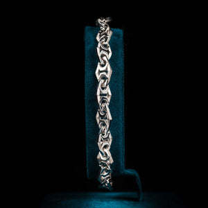 Luxury Xylem bracelet handcrafted in 18K white ethical gold with rhodium plating, inspired by nature's vital channels—symbolizing strength, growth, and the quiet beauty of staying rooted. Designed by Riccardo Contini.